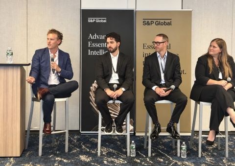 Panel discussion on stage at S&P Global's AI in Action event in New York